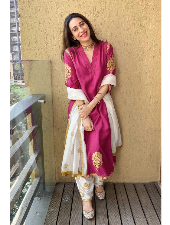 Karishma Kapoor wearing a dark pink Kurta for girls